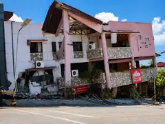 Collapsed building rubble in General Santos after the June 2026 earthquake